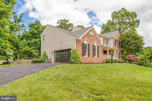 10101 Westover Ct, Fredericksburg, VA 22408 - view of front of home with driveway, brick siding, a garage, and a shingled roof