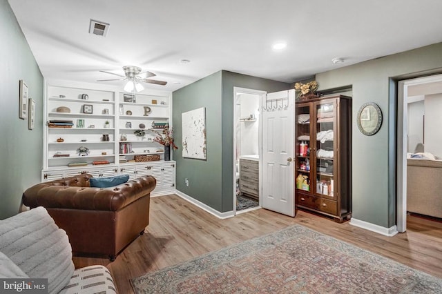 10101 Westover Ct, Fredericksburg, VA 22408 - living area with wood finished floors, ceiling fan, and baseboards