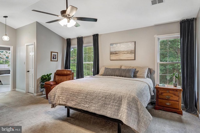 10101 Westover Ct, Fredericksburg, VA 22408 - carpeted bedroom featuring multiple windows, vaulted ceiling, baseboards, and ceiling fan
