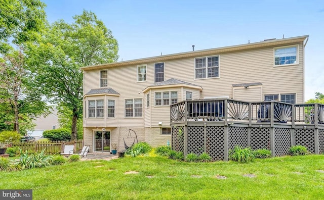 10101 Westover Ct, Fredericksburg, VA 22408 - rear view of property with a deck and a lawn