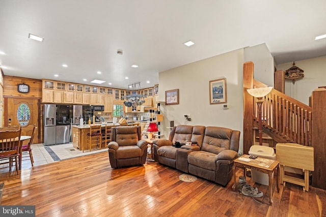 362 Dell Perkins Rd, Louisa, VA 23093 - living room with light wood finished floors, recessed lighting, stairway, and wooden walls
