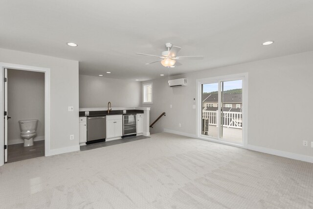 3251 Preston Shore Dr Unit 18E, Rockingham, VA 22801 - unfurnished living room with wine cooler, light colored carpet, ceiling fan, baseboards, and recessed lighting