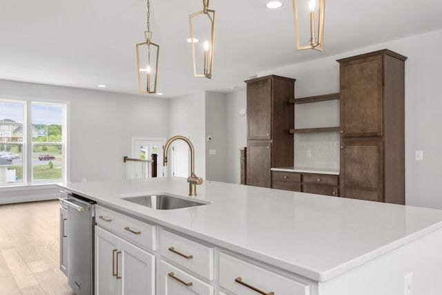 3251 Preston Shore Dr Unit 18E, Rockingham, VA 22801 - kitchen featuring open shelves, a sink, stainless steel dishwasher, recessed lighting, and light countertops