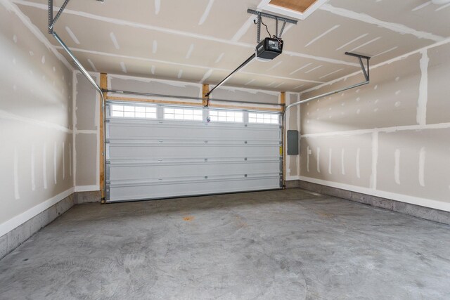 3251 Preston Shore Dr Unit 18E, Rockingham, VA 22801 - garage with a garage door opener and baseboards