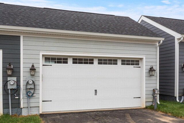 3251 Preston Shore Dr Unit 18E, Rockingham, VA 22801 - garage featuring asphalt driveway