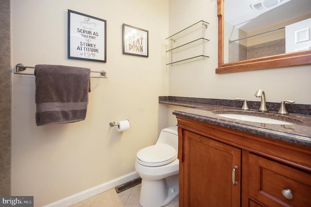 full bath with vanity, toilet, tile patterned flooring, and baseboards