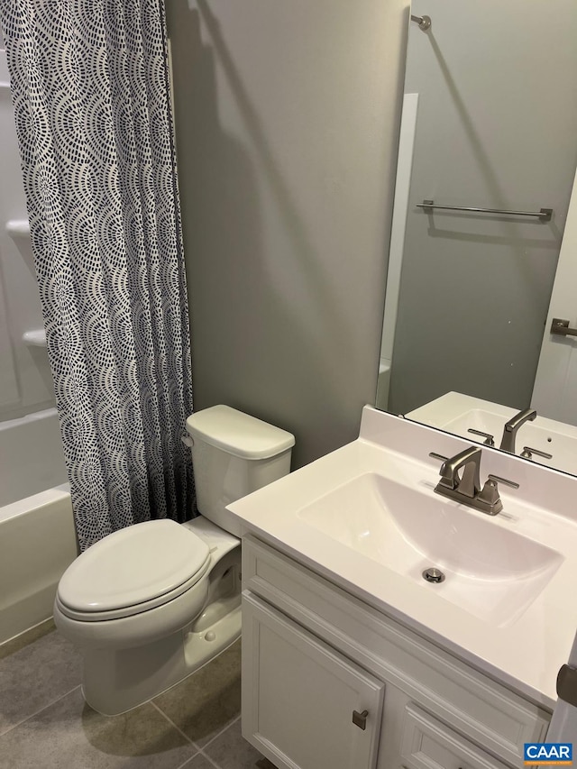 bathroom with vanity, shower / bath combo, toilet, and tile patterned floors