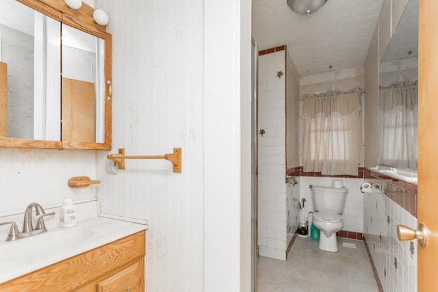 1627 Barbershop Rd, Edinburg, VA 22824 - bathroom featuring vanity, tile walls, and toilet