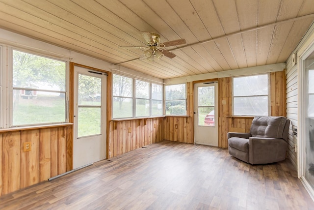 1627 Barbershop Rd, Edinburg, VA 22824 - sunroom with wooden ceiling, wood walls, and wood finished floors