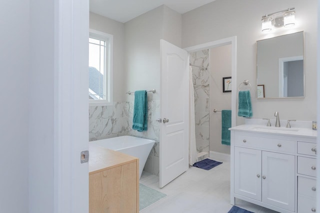 bathroom featuring vanity and a bathtub