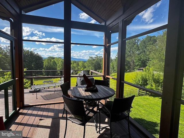 103 Castleton Ford Rd, Castleton, VA 22716 - sunroom featuring vaulted ceiling, view of scattered trees, and plenty of natural light
