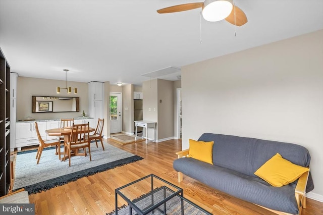 103 Castleton Ford Rd, Castleton, VA 22716 - living room featuring attic access, light wood finished floors, and baseboards