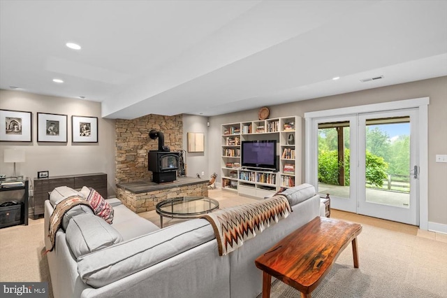 103 Castleton Ford Rd, Castleton, VA 22716 - living room with a wood stove, light carpet, and recessed lighting