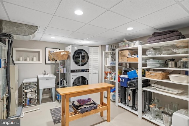 103 Castleton Ford Rd, Castleton, VA 22716 - finished basement featuring stacked washer / drying machine, a drop ceiling, recessed lighting, and a sink