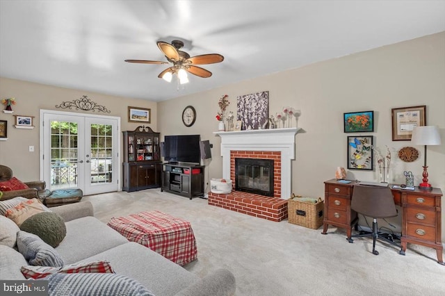 1218 Heatherbrook Ct, Fredericksburg, VA 22407 - living room featuring french doors, light carpet, a ceiling fan, and a fireplace