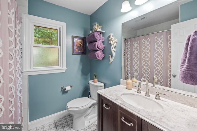 1218 Heatherbrook Ct, Fredericksburg, VA 22407 - full bath featuring toilet, vanity, baseboards, tile patterned floors, and a shower with shower curtain