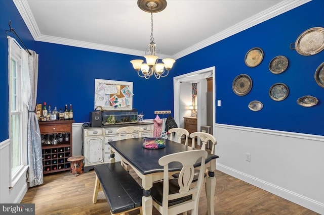 1218 Heatherbrook Ct, Fredericksburg, VA 22407 - dining area with a chandelier, crown molding, wood finished floors, and baseboards