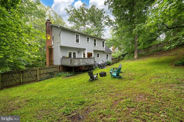 1218 Heatherbrook Ct, Fredericksburg, VA 22407 - back of house featuring a chimney, a fire pit, and a deck