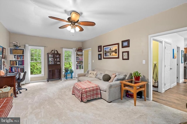 1218 Heatherbrook Ct, Fredericksburg, VA 22407 - carpeted living room featuring an office area, ceiling fan, and baseboards