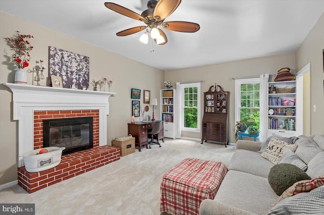 1218 Heatherbrook Ct, Fredericksburg, VA 22407 - living area featuring carpet, ceiling fan, a brick fireplace, a desk, and baseboards