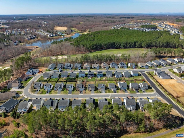 aerial view featuring a water view and a residential view