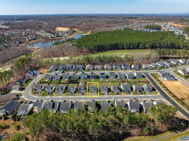 aerial view with a water view and a residential view