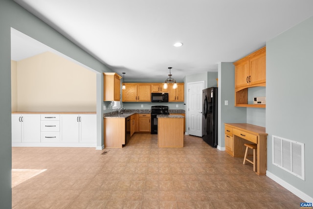 kitchen with a center island, visible vents, baseboards, black appliances, and recessed lighting