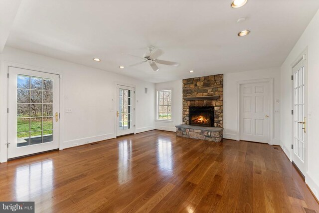  - foyer featuring light wood finished floors, baseboards, stairway, and elevator