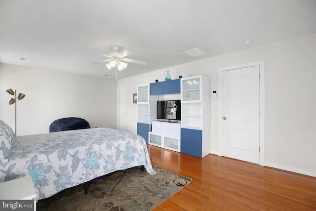 10707 Tricia Pl, Fredericksburg, VA 22408 - bedroom featuring wood finished floors, baseboards, and a ceiling fan
