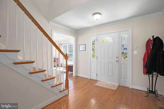 10707 Tricia Pl, Fredericksburg, VA 22408 - foyer entrance featuring stairs, light wood-style floors, baseboards, and crown molding