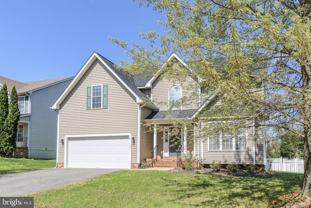 10707 Tricia Pl, Fredericksburg, VA 22408 - traditional-style house with driveway, an attached garage, and a shingled roof