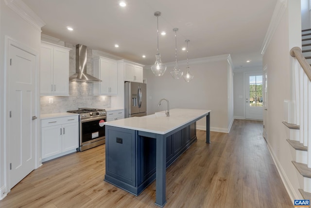 403 Bayberry Ln, Zion Crossroads, VA 22942 - kitchen with stainless steel appliances, wall chimney range hood, backsplash, ornamental molding, and white cabinets