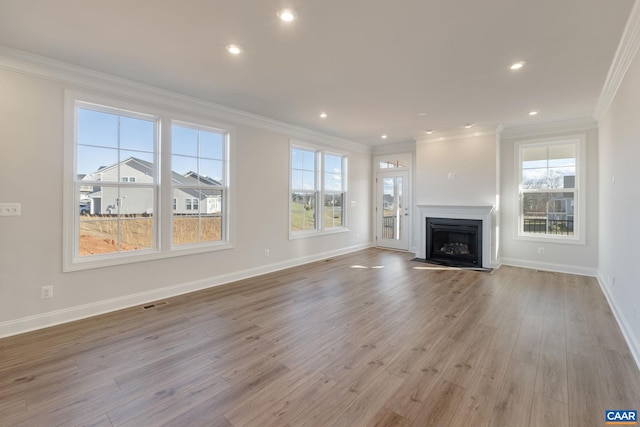 403 Bayberry Ln, Zion Crossroads, VA 22942 - unfurnished living room featuring ornamental molding, light wood finished floors, a fireplace, and recessed lighting