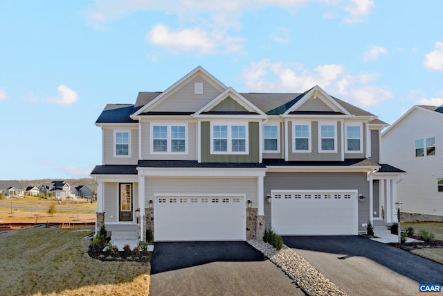 403 Bayberry Ln, Zion Crossroads, VA 22942 - view of front of house with driveway, a garage, stone siding, and entry steps