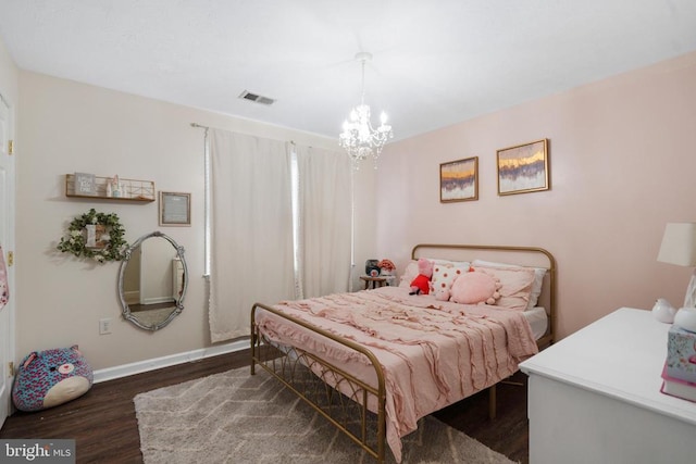 114 Wanda St W, Stanley, VA 22851 - bedroom with wood finished floors and a chandelier