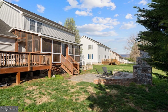 114 Wanda St W, Stanley, VA 22851 - rear view of property with a sunroom, a patio, a deck, and a lawn