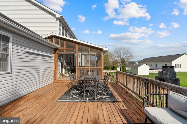 114 Wanda St W, Stanley, VA 22851 - wooden deck featuring a sunroom and outdoor dining space