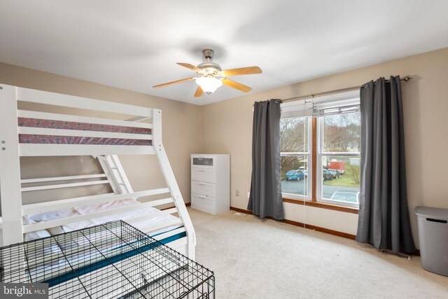 11404 Warner Dr, Fredericksburg, VA 22407 - carpeted bedroom with baseboards and ceiling fan