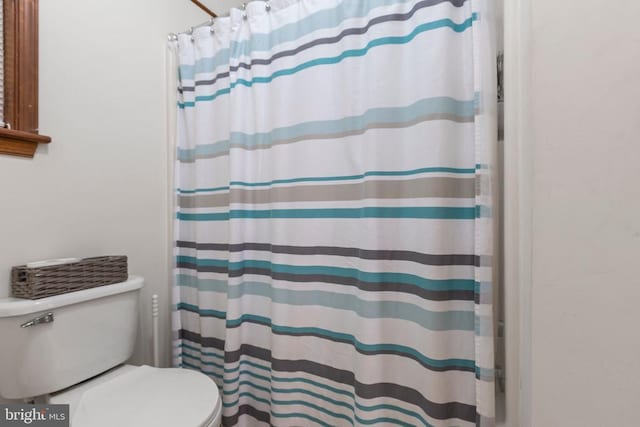 11404 Warner Dr, Fredericksburg, VA 22407 - bathroom featuring toilet and curtained shower