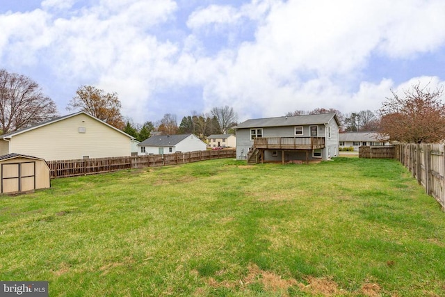 11404 Warner Dr, Fredericksburg, VA 22407 - view of yard with a wooden deck, stairs, a storage shed, and an outdoor structure