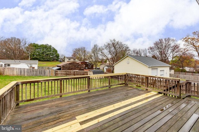 11404 Warner Dr, Fredericksburg, VA 22407 - deck with an outdoor structure, a garage, and a residential view