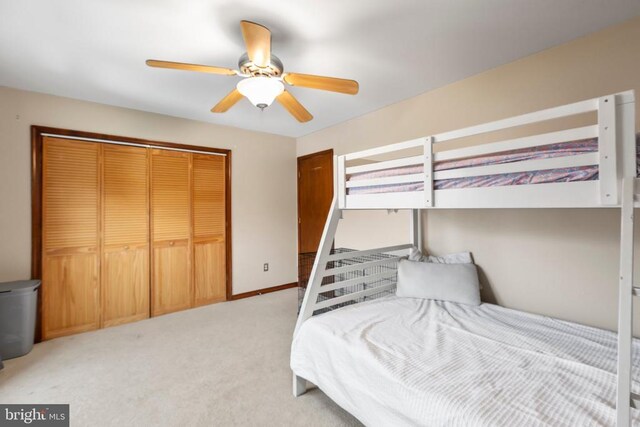 11404 Warner Dr, Fredericksburg, VA 22407 - bedroom featuring a closet, light colored carpet, and ceiling fan