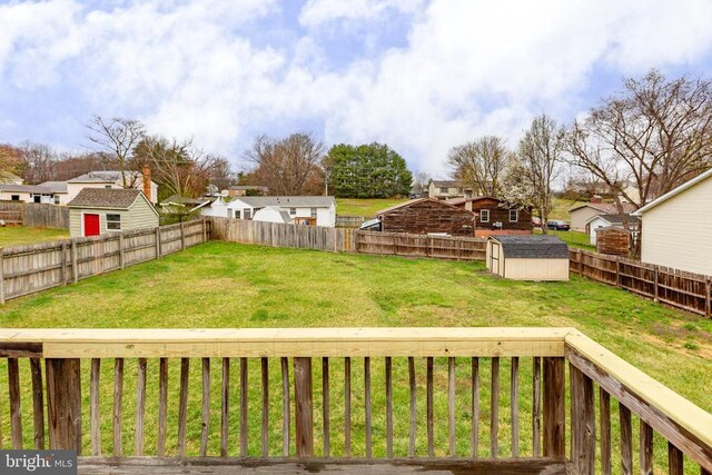 11404 Warner Dr, Fredericksburg, VA 22407 - view of yard featuring a storage unit, an outdoor structure, and a residential view