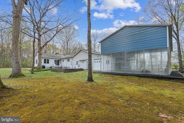 7408 Ryan Ct, Reva, VA 22735 - view of home's exterior with a garage and a yard