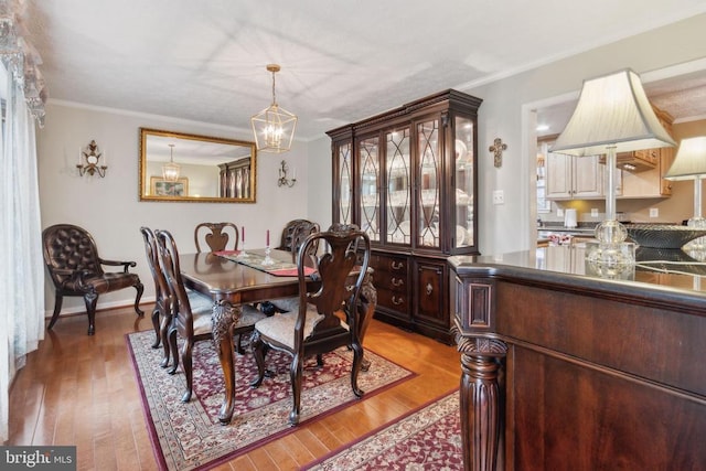 7408 Ryan Ct, Reva, VA 22735 - dining area featuring crown molding and light wood-type flooring