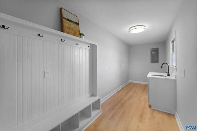 912 Shores Rd, Palmyra, VA 22963 - mudroom with a sink, light wood finished floors, and baseboards