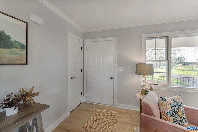 912 Shores Rd, Palmyra, VA 22963 - entrance foyer with baseboards, light wood-style floors, and crown molding