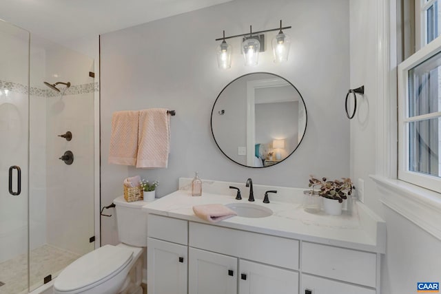 912 Shores Rd, Palmyra, VA 22963 - bathroom featuring vanity, toilet, and a shower stall