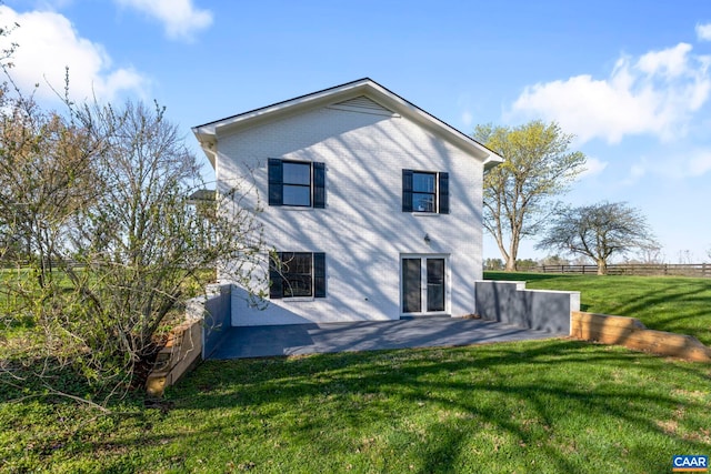 912 Shores Rd, Palmyra, VA 22963 - rear view of house featuring a lawn, a patio, and fence