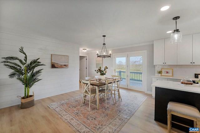 912 Shores Rd, Palmyra, VA 22963 - dining space featuring a chandelier, crown molding, and light wood-style floors